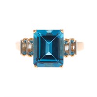 A Lady's 14K Blue Topaz Ring