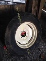 (1) spare wheel and tire for gravity bed wagon