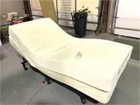 Fully adjustable massaging Tempurpedic bed. Twin