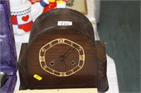 Wooden mantle clock.