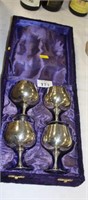 Four plated brandy goblets boxed.