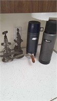 Two old meat grinders and two thermoses