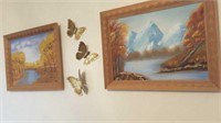 Two paintings and butterflies on wall, telephone