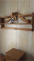 Jewelry cabinet and quilt rack on the wall