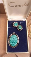 Turquoise and silver jewelry, brooches,