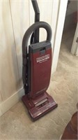 Hoover convertible vacuum and a picture on the