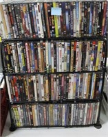 159 DVD'S - ASSORTED TITLES ON WIRE SHELF