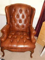 BROWN LEATHER WING BACK CHAIR