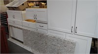 Set of White Wood Kitchen Cabinets and Sink