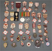 ~70 medals/pins/buttons, mostly British Red Cross.
