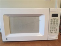 GE microwave oven model no. JES0738DP1WW