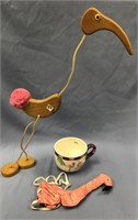 Flamingo puppet and a very large coffee cup