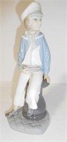 Lot #197 Lladro 10” sailor boy figurine