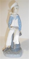 Lot #196 Lladro 10” sailor boy figurine