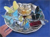 8 light catchers in a metal serving dish