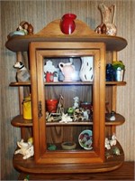 Small curio cabinet with miniatures as shown