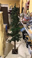 Skinny Christmas tree, 62 inches tall, need to