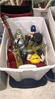 Tote with lid full of children’s toys including a