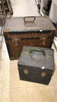 Two antique travel trunks, one is called the