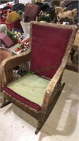 Antique wicker rocking chair with original