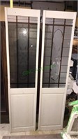 Two matching door panels with glass tops,