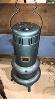 Antique tin kerosene heater, 24 inches tall,