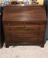 Antique walnut drop front desk with four drawers,
