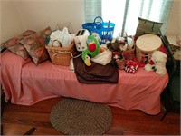 Daybed With Items On Top And On Floor As Shown
