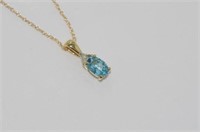 14ct yellow gold blue topaz pendant & 14ct chain