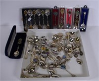 Box of assorted silver and other souvenir spoons