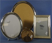 Four various silver plated photo frames