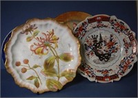Four various porcelain serving plates