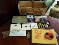 Matches, soap, Olympic coin, buckle, marble
