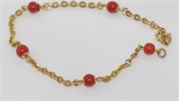 18ct yellow gold and red coral bracelet