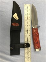 Beautiful knife 9" long with red wood handle