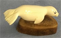 Charles Edwards 3.75" swimming ivory seal with ins