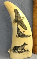 Scrimshawed whale's tooth by Peter Mayac, 7" long