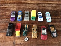11 vintage toy cars and 1 motorcycle