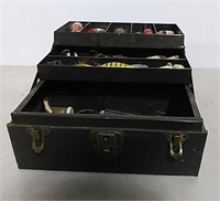 Tackle box full of lures and other items