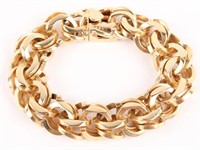 14KT YELLOW GOLD HEAVY CHARM BRACELET