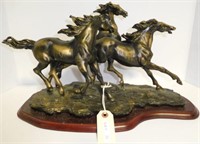 Lot #21 Statuette of three wild stallions in