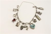 Sterling Silver Charm Bracelet. 11 Charms
