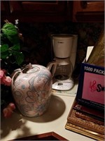 Coffee pot with big vase with design
