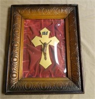 Framed Crucifix under Convex Glass.