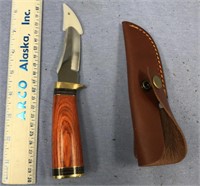 8" long buck knife, with a 3 3/4" blade, made in P