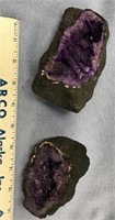 Lot of 2 geodes, all black on the outside, purple
