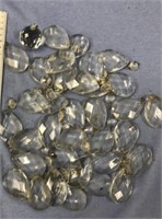 Bag of crystal chandelier pieces, unknown quantity