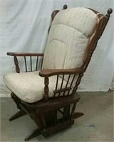 Wooden glider/rocker, with stain on cushion