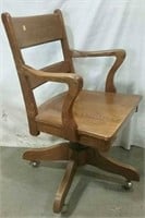 oak swivel chair on wheels