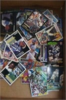 About 150 Baseball and Football Trading Cards